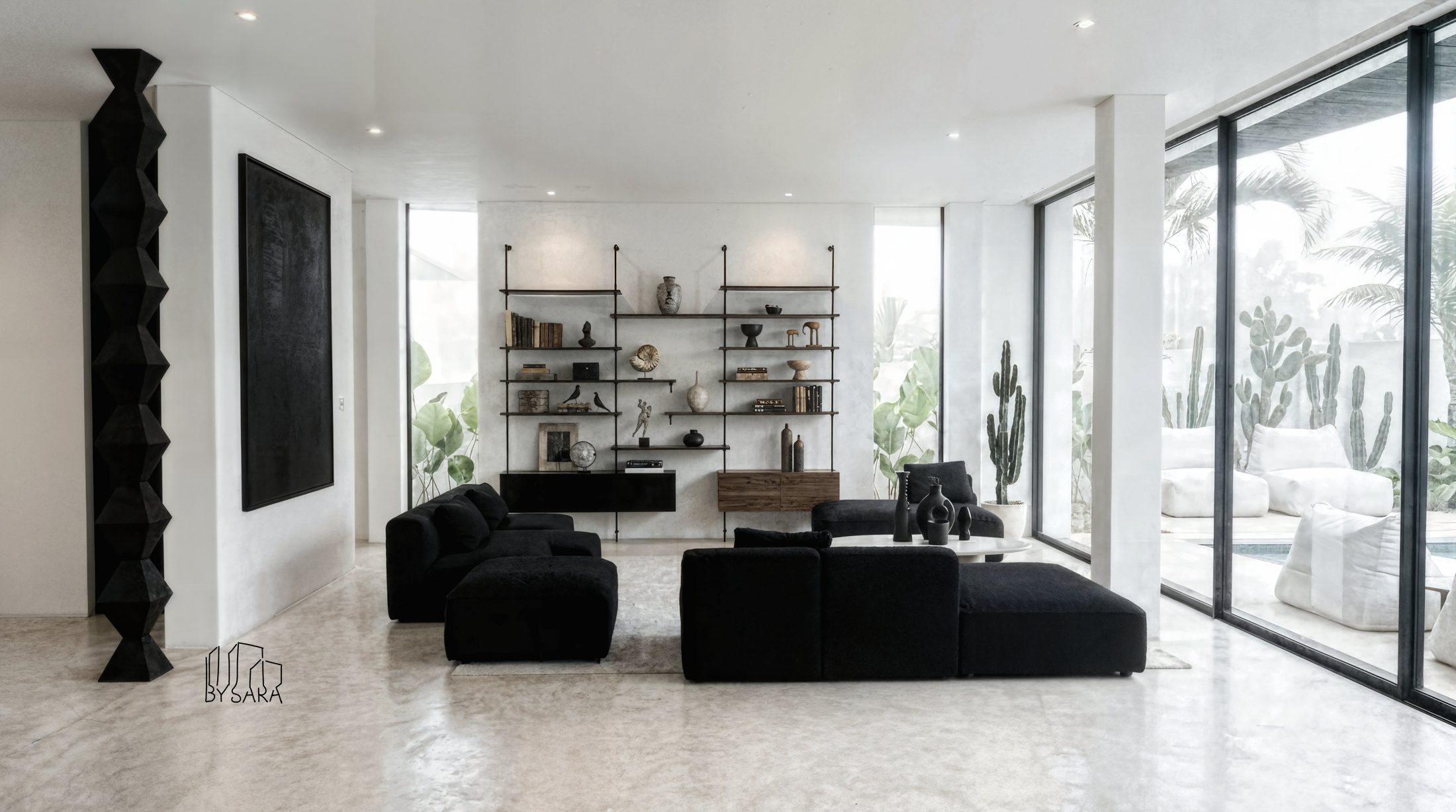 Living room in black and white with sculptural black totem, micro-cement floor