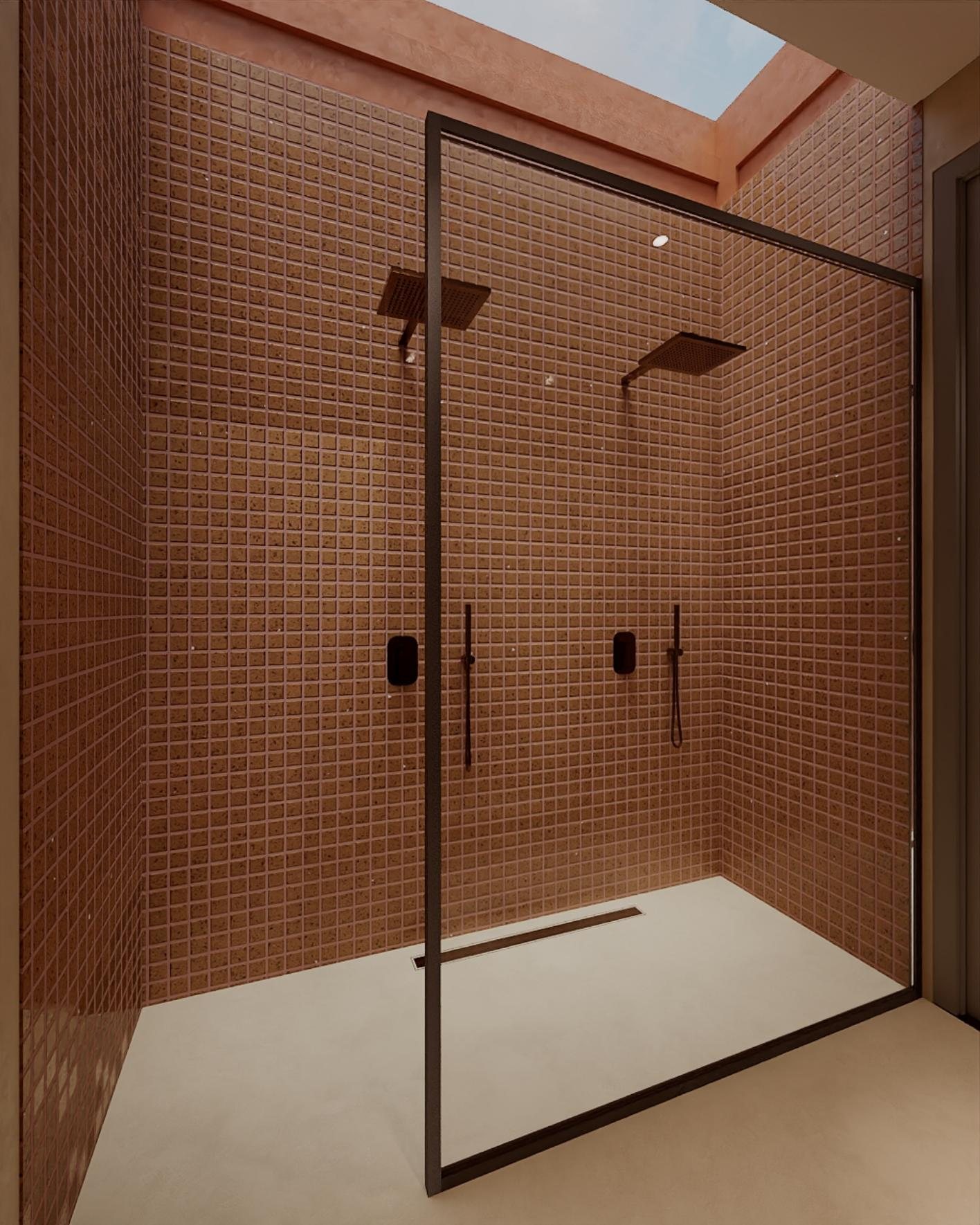 THE CURVE · terracotta mosaic shower under zenithal light